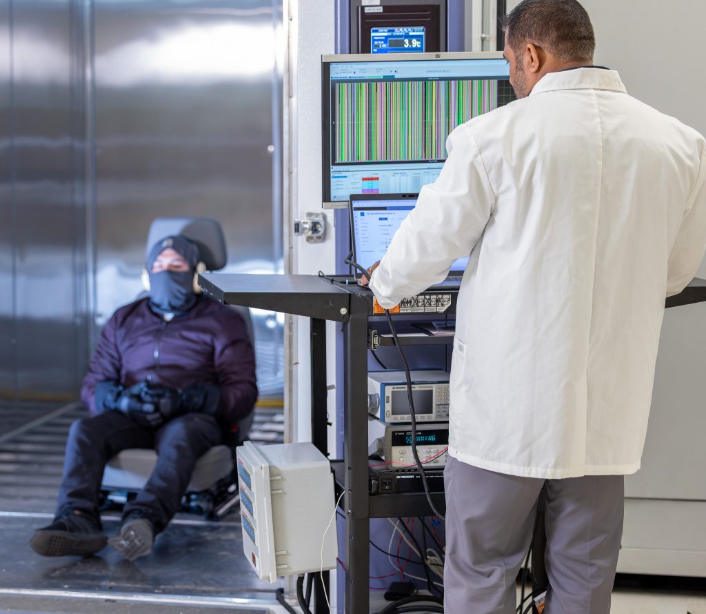 Lab Assistant testing the Seat and collecting data by monitoring